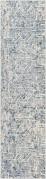 Close-up of the Capaga Area Rug. Beige, gray, and denim geometric pattern. Contemporary style. Design-Runner-2610