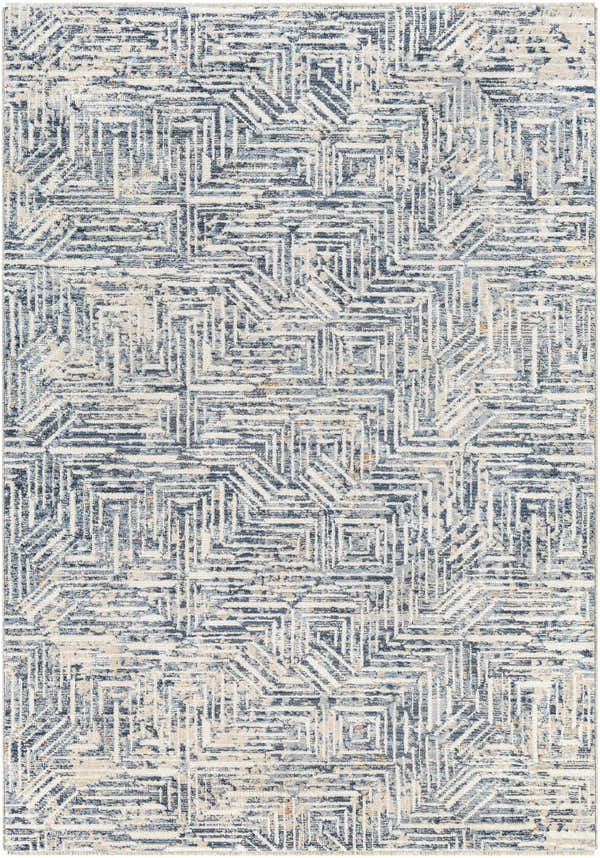 Close-up of the Capaga Area Rug showcasing its geometric pattern in beige, dark gray, and denim hues. Design-Rectangle-579