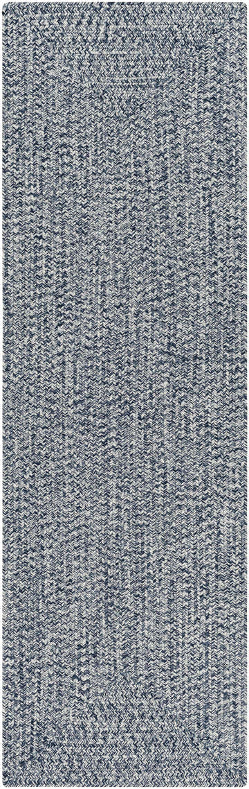 Close-up of the Blue Braided Faux Jute Rug. Denim and cream rug with a textured, braided weave pattern. Contemporary style. Design-Runner-268