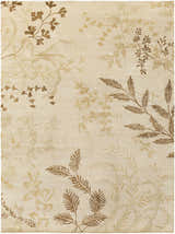 Close-up of the Carpinteria Area Carpet. Hand-knotted wool rug with a botanical pattern in dark brown, khaki, and tan hues. Design-Rectangle-811