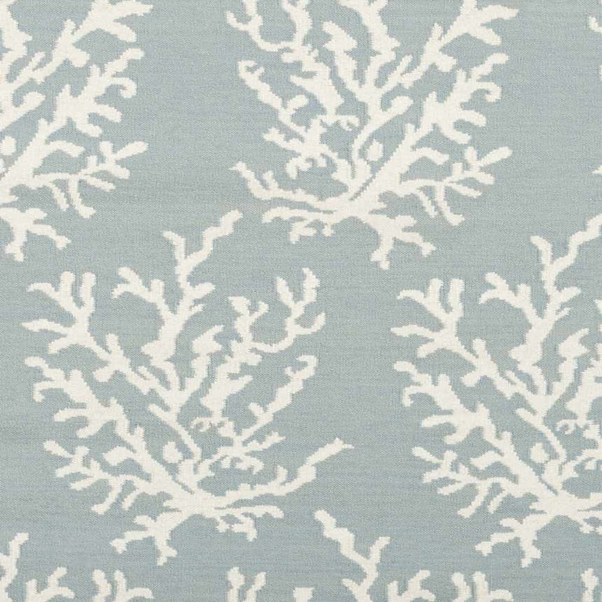 Close-up of Carversville Ice Blue Botanical Wool Rug featuring an ivory coral-like pattern on a light blue background. Swatch