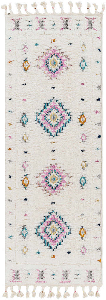 Close-up of the Catungan Area Rug. Cream shag rug with bohemian diamond and floral patterns in aqua, pink, and yellow. Design-Runner-2773