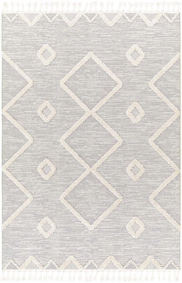 Close-up of Cauldwell High/Low Pile Rug. Gray rug with ivory geometric pattern and tassels. Contemporary, Southwestern style. Design-Rectangle-537