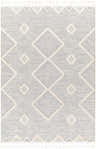 Close-up of Cauldwell High/Low Pile Rug. Gray rug with ivory geometric pattern and tassels. Contemporary, Southwestern style. Design-Rectangle-537