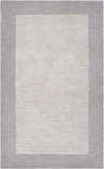 Close-up of a hand-loomed Bordered Solid Gray Wool Rug featuring a charcoal border and lighter gray center. Design-Rectangle-58