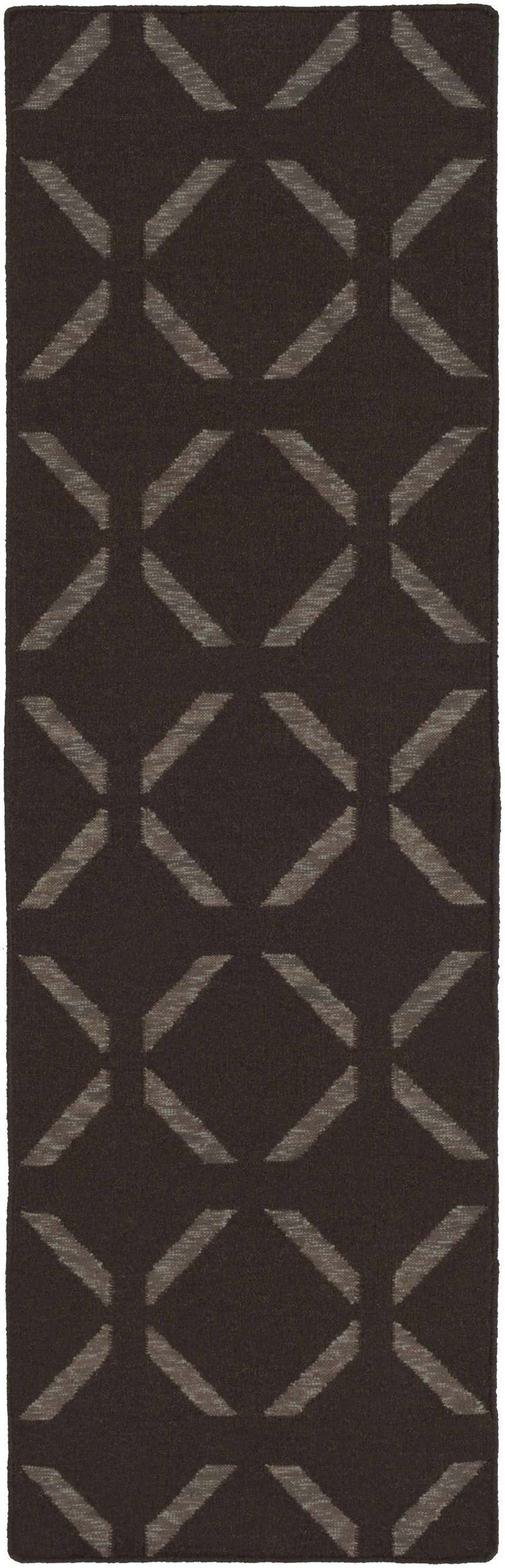 Close-up of the Charty Hand Woven Area Carpet. Dark brown wool rug with an off white geometric diamond pattern. Design-Runner-268