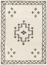 Close-up of the Cheam Area Rug. Cream shag rug with black bohemian-inspired geometric patterns and border. Design-Rectangle-537