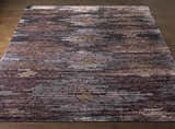 Close-up of the Cherokee Carpet. Hand-knotted viscose rug with charcoal, gray, olive, lilac, and plum hues. Contemporary style. Front
