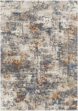 Close-up of the Chetwynd Abstract Thick Rug. Features a distressed pattern with blue, brown, cream, and gray tones. Design-Rectangle-5373