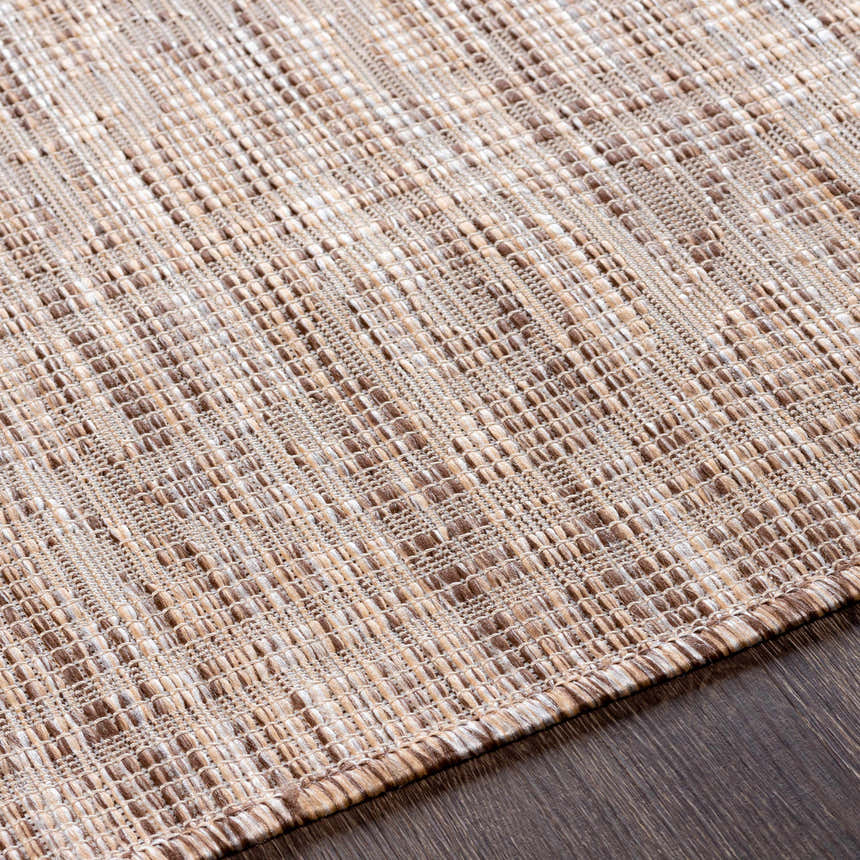 Close-up of the Coolville Brown Flatweave Area Carpet showing its textured weave and neutral brown, cream, and tan colors. Texture