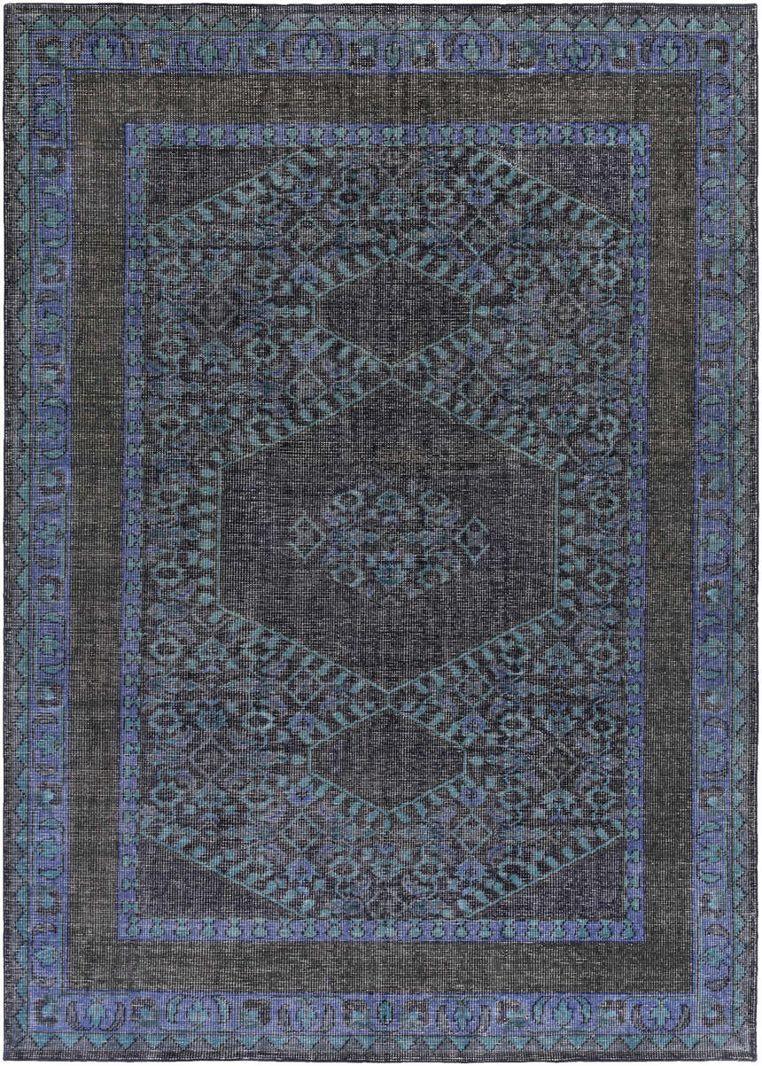 Close-up of the Chesham Clearance Rug. Hand-knotted wool rug in charcoal, dark blue, and teal with a traditional geometric pattern. Design-Rectangle-811