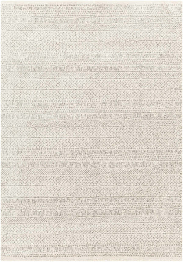 Close-up of the Cinco Luxe Rug showing a bone and driftwood color palette with a subtle, contemporary stripe pattern. Design-Rectangle-5373