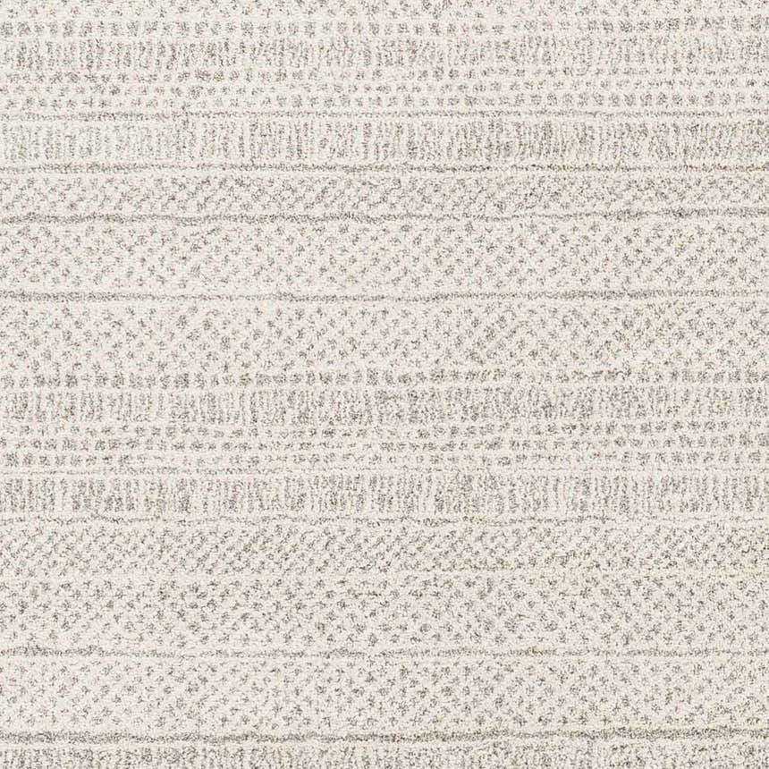 Close-up of the Cinco Luxe Rug showing its bone and gray textured, striped, mid-century modern design. Swatch