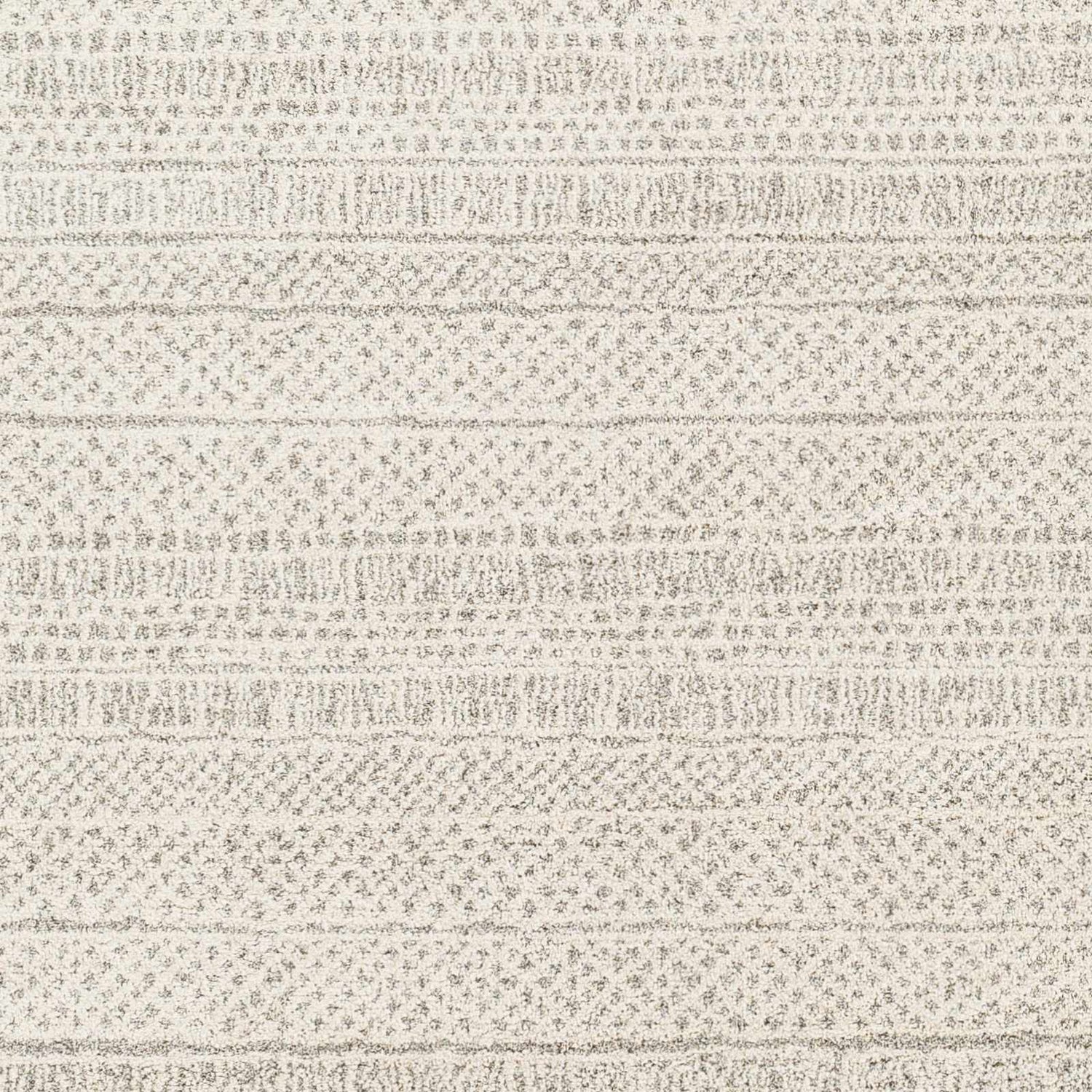 Close-up of the Cinco Luxe Rug showing its bone and gray textured, striped, mid-century modern design. Swatch