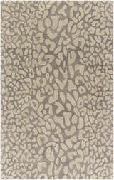 Close-up of the Circa Leopard Print Area Rug in beige and beachhouse colors. Hand-tufted wool rug with a contemporary leopard pattern. Design-Rectangle-58