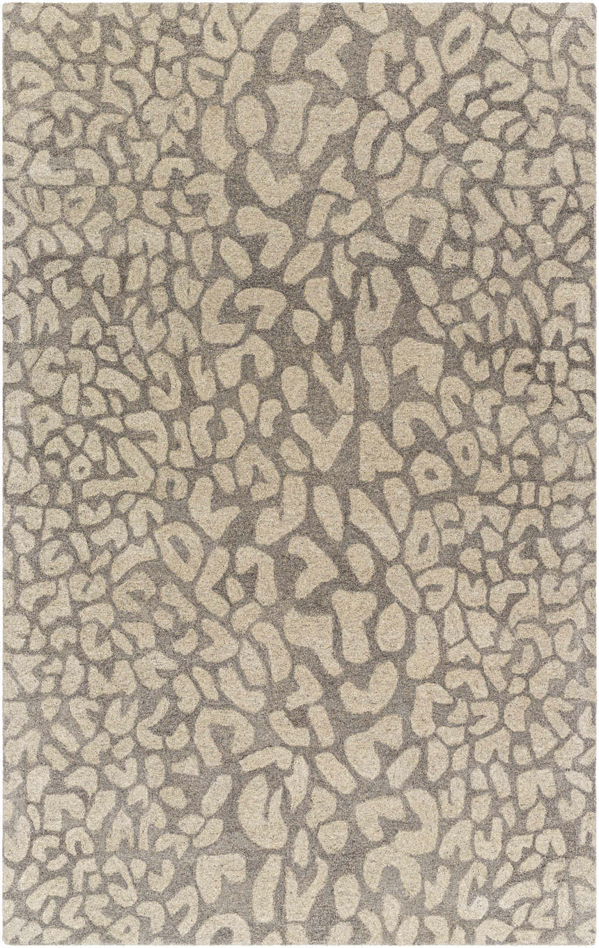 Close-up of the Circa Leopard Print Area Rug in beige and beachhouse colors. Hand-tufted wool rug with a contemporary leopard pattern. Design-Rectangle-58