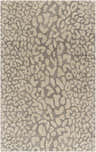 Close-up of the Circa Leopard Print Area Rug in beige and beachhouse colors. Hand-tufted wool rug with a contemporary leopard pattern. Design-Rectangle-58