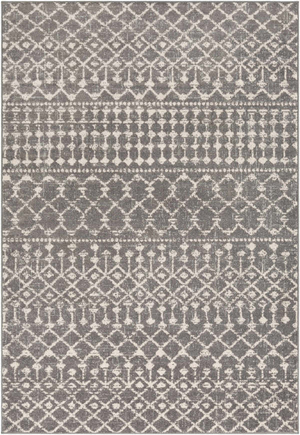 Close-up of the Cliffwood Area Rug. Charcoal gray rug with light beige geometric diamond and stripe pattern. Design-Rectangle-5373