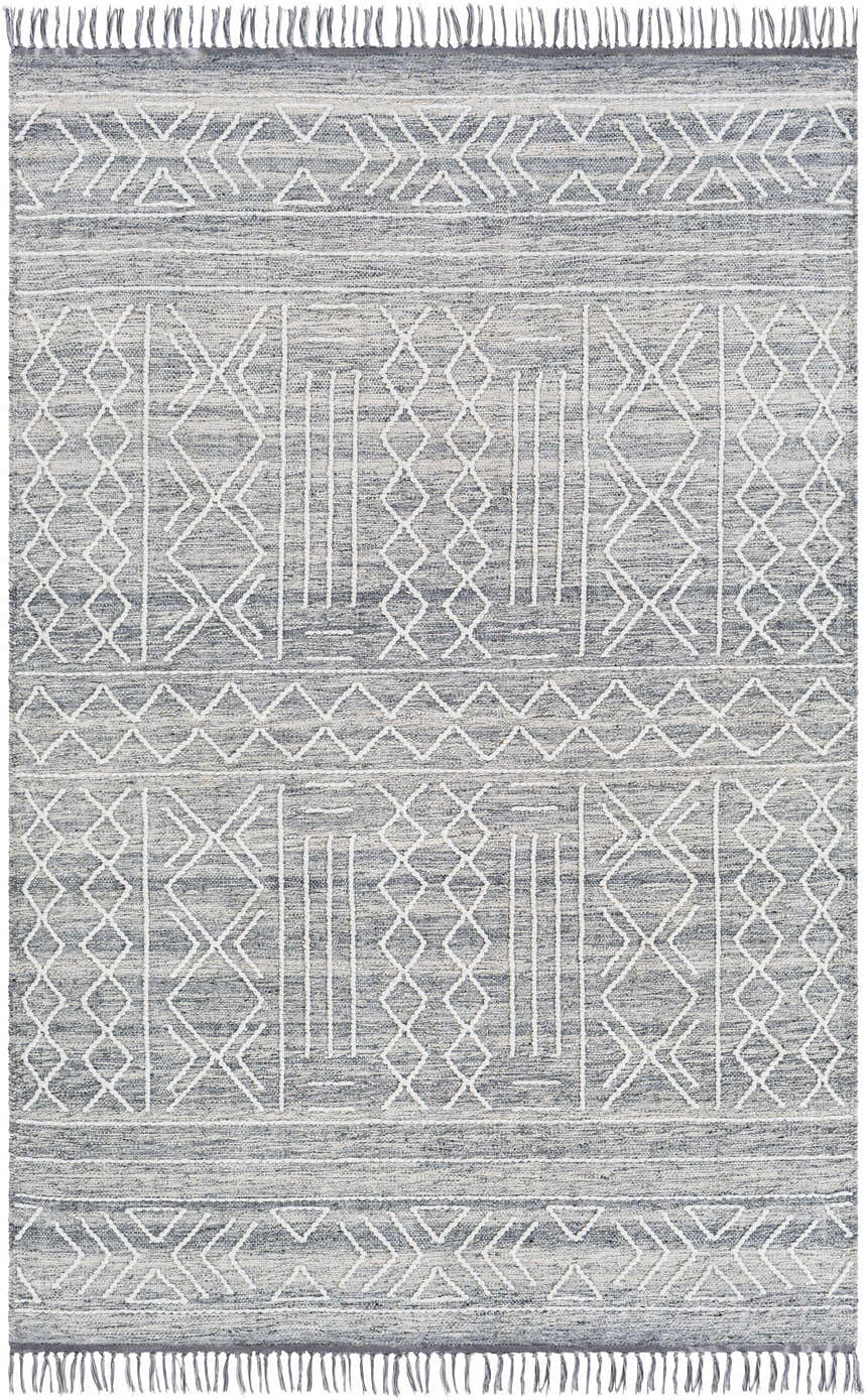Close-up of Gray Clintwood Wool Tassel Carpet. Hand-woven rug with charcoal, cream, and white geometric pattern and tassels. Design-Rectangle-5373