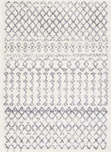 Close-up of the Clarkia Area Rug: a shag rug with a geometric diamond pattern in gray and white. Design-Rectangle-5373