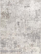 Close-up of the Calvinia Area Rug, showcasing its contemporary charcoal, gray, and light gray abstract design. Design-Rectangle-527