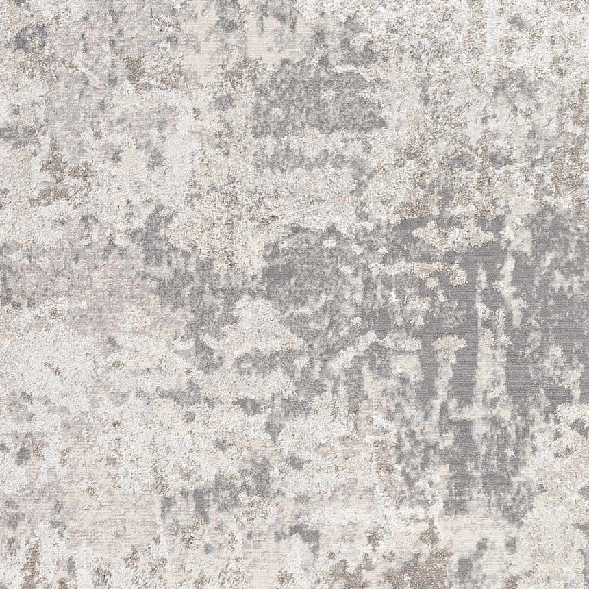 Close-up of the contemporary Calvinia Area Rug. Charcoal, gray, and light gray abstract pattern. Swatch