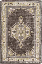 Top-down view of the Clyo Carpet, a hand-knotted wool rug in brown, gray, and off-white with a traditional pattern. Design-Rectangle-23