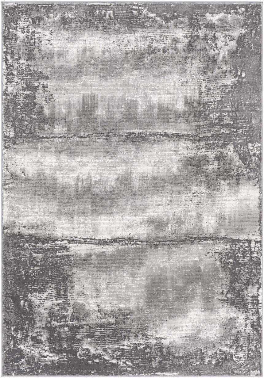 Close-up of the Coombs Area Rug. Charcoal, gray, and light gray distressed pattern. Machine woven texture. Design-Rectangle-5377