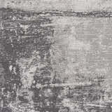 Close-up of the Coombs Area Rug featuring a charcoal and gray abstract pattern with horizontal lines. Swatch
