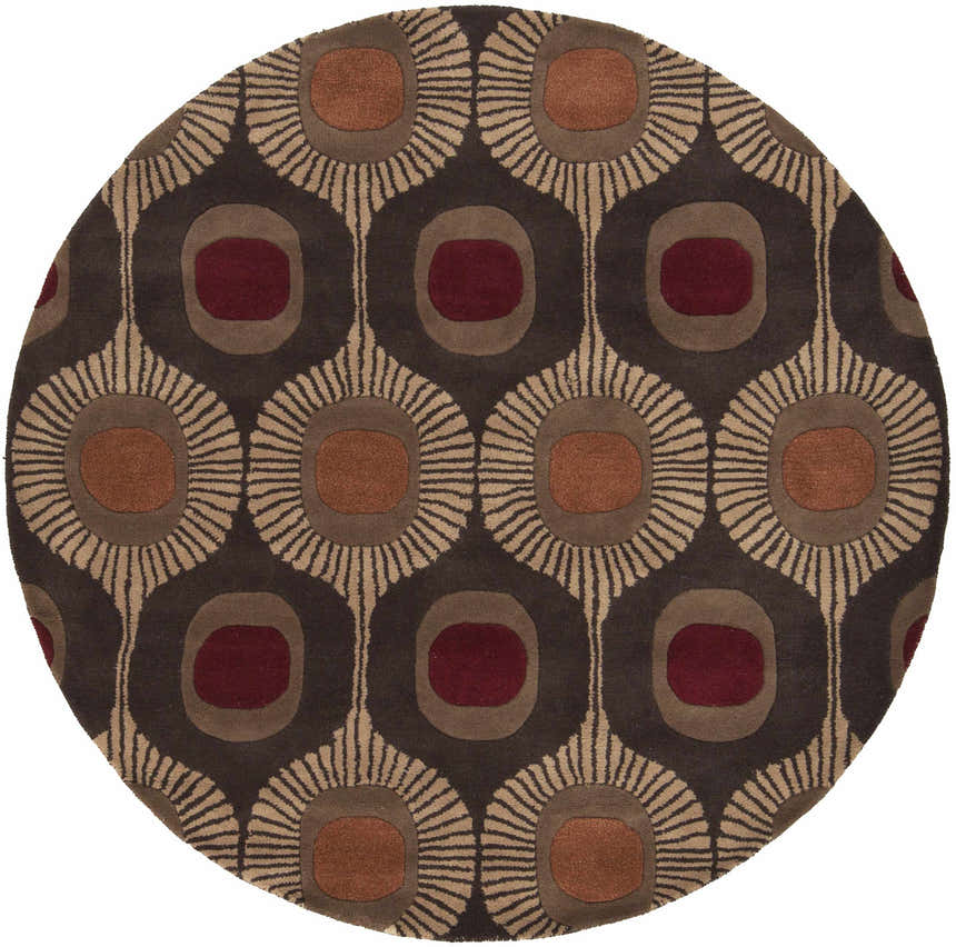 Close-up of the round Canovanas Modern Wool Rug. Features a geometric pattern in brown, tan, and burgundy hues. Design-Round-6