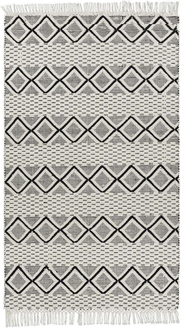 Close-up of the Cobourg Area Carpet. Black geometric diamond pattern on cream wool with fringe. Hand woven rug texture. Design-Rectangle-576