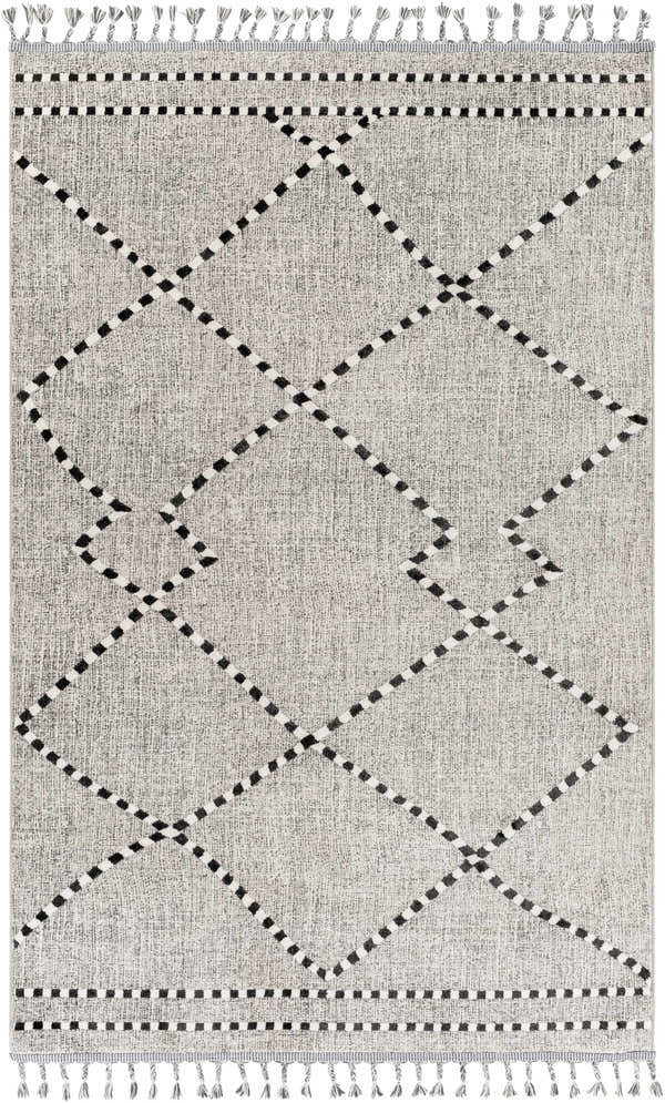 Close-up of the Coen Area Rug. Dark gray geometric pattern on a multi-brown and natural gray woven texture with tassels. Design-Rectangle-57