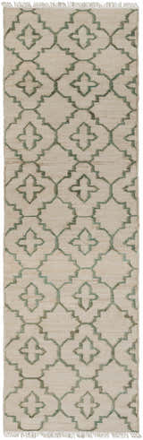 Close-up of Coffeyville Handcrafted Fringed Jute Carpet in cream and sage. Hand-woven rug with a geometric pattern and fringed edges. Design-Runner-268
