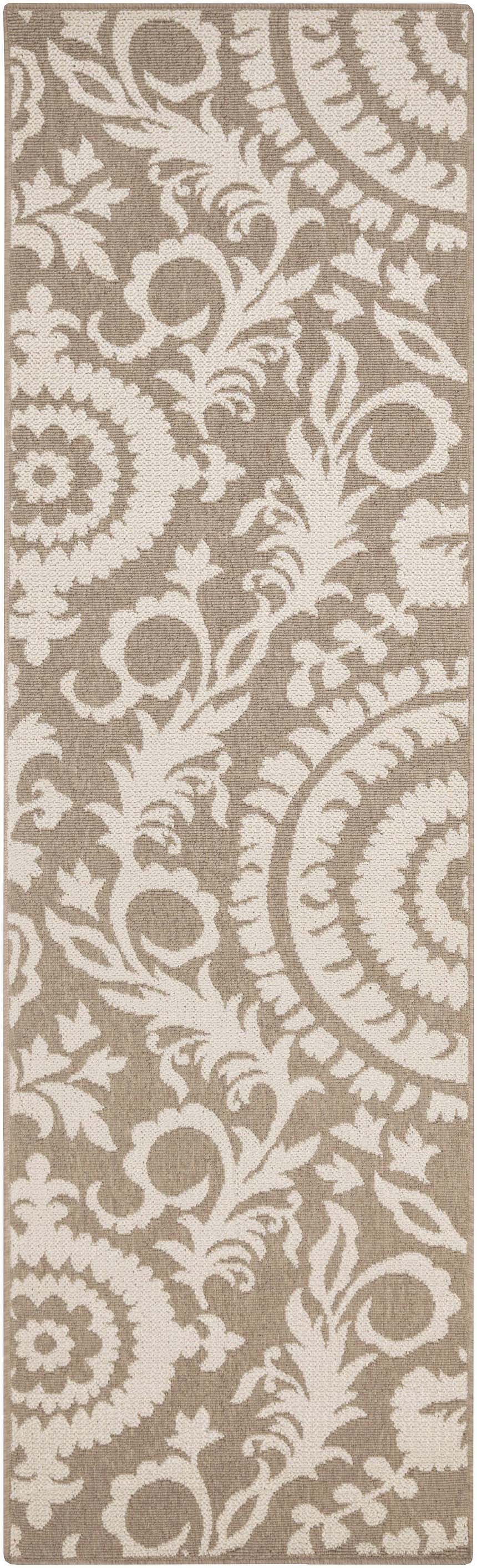 Close-up of the Collegeport Area Rug. Light beige floral pattern on a light brown olefin rug. Machine woven texture. Design-Runner-2379