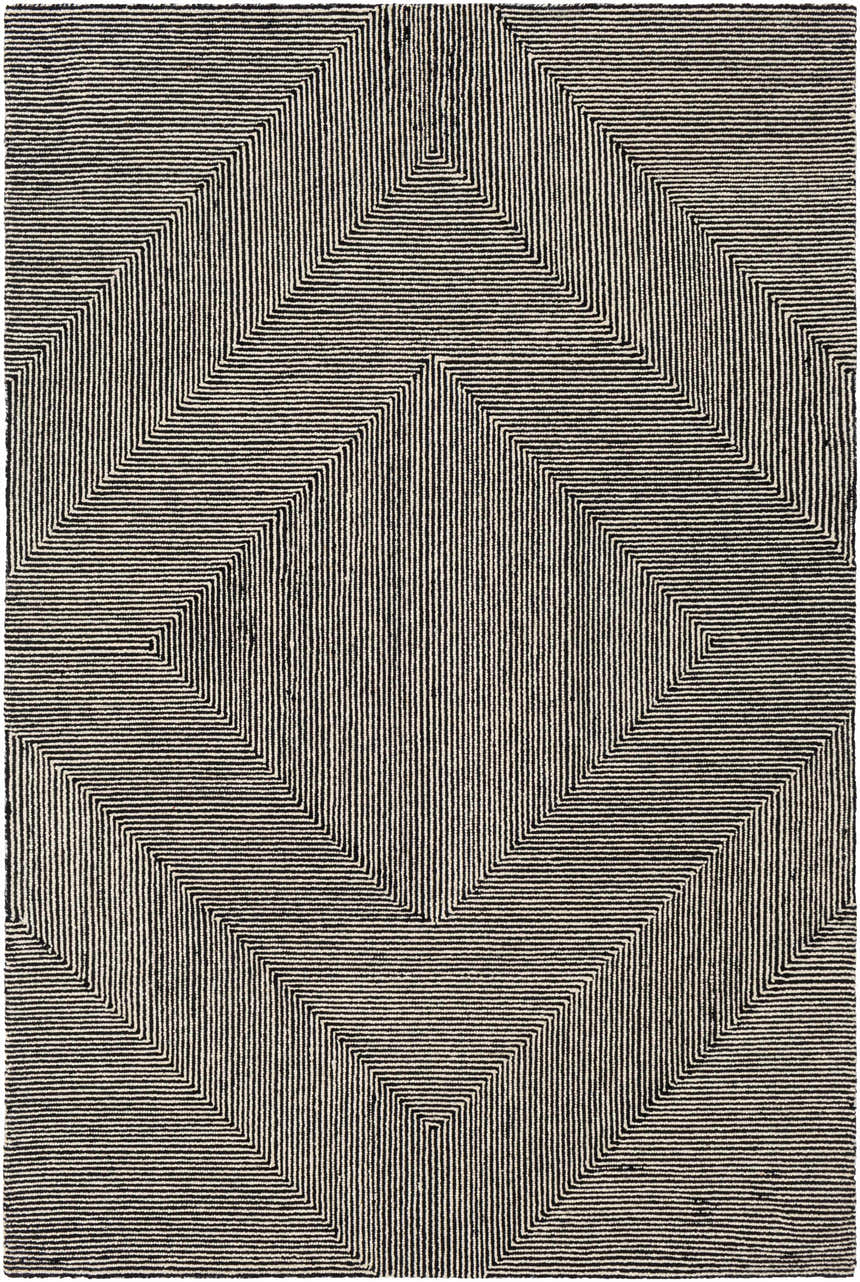 Close-up of the Conshohocken Area Rug. Black and cream wool rug with a bold, geometric, concentric diamond pattern. Design-Rectangle-576