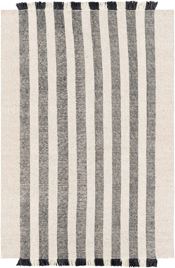 Close-up of the Contrecoeur Area Carpet. Hand-woven wool rug with black and cream stripes and fringed edges. Design-Rectangle-576
