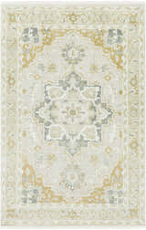 Close-up of the Convent Area Rug. Hand-knotted wool rug in cream, light sage, mustard, and tan with a traditional oriental pattern. Design-Rectangle-69
