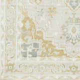 Close up of the hand-knotted Convent Area Rug. Cream, sage, mustard, and tan oriental rug pattern. Swatch