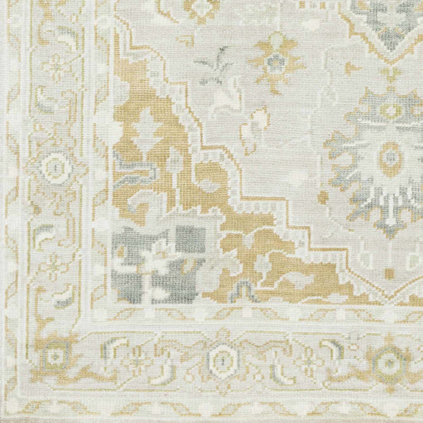 Close up of the hand-knotted Convent Area Rug. Cream, sage, mustard, and tan oriental rug pattern. Swatch