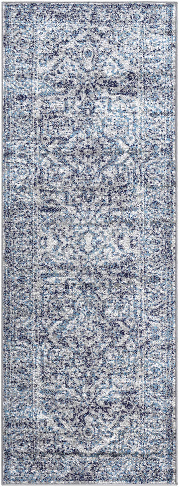 Close-up of the Costigan Traditional Navy Rug. Features a vintage-inspired design in blue, charcoal, gray, navy, and white. Design-Runner-2710