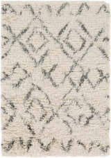 Close-up of the Cotgrave 2x3 Cream Trellis Wool Rug. Features a shag texture and geometric trellis pattern. Design-Rectangle-23
