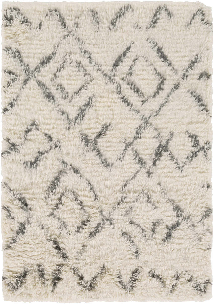 Close-up of the Cotgrave 2x3 Cream Trellis Wool Rug. Features a shag texture and geometric trellis pattern. Design-Rectangle-23