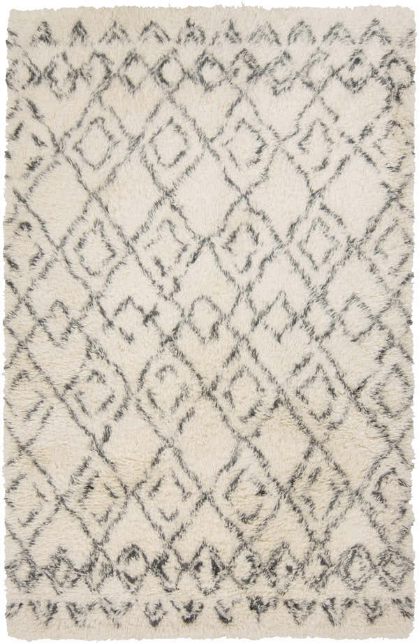 Close-up of the Cotgrave 2x3 Cream Trellis Small Wool Rug, featuring a geometric trellis pattern and soft, shag texture. Design-Rectangle-58