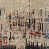 Close-up of Coudersport Carpet showing abstract black, brick red, and blue patterns on a tan, hand-knotted wool rug. Swatch