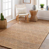 Light and airy room scene with Buwoi Hand Woven Tan Jute Rug, woven chair, and natural wood accents. Roomscene-Rectangle