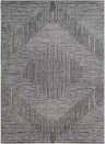 Close-up of the Carnarvon Area Rug, a machine-woven rug with a geometric black, cream, and gray pattern. Design-Rectangle-5373