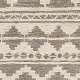 Close-up of the hand woven Cresco Jute Carpet. Charcoal and ivory geometric pattern rug texture. Swatch