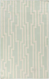 Close-up of the Carteret Area Rug. Ice blue wool rug with a light beige geometric stripe pattern. Hand woven. Design-Rectangle-58