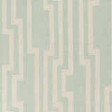 Close-up of the Carteret Area Rug. Ice blue rug with a light beige geometric stripe pattern. Hand woven wool texture. Swatch