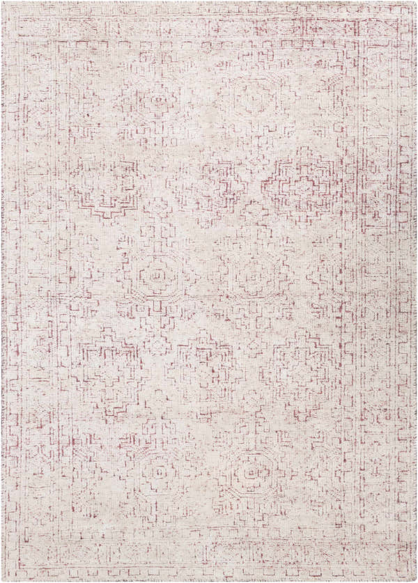 Close-up of the Cunderdin Carpet, a hand-knotted rug in a farmhouse style with a mauve and white geometric pattern. Design-Rectangle-69